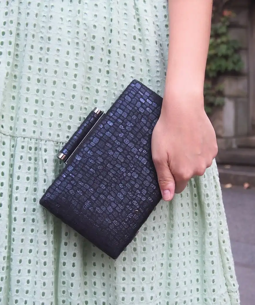 Crocodile pattern clutch bag
